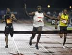 Jamaicas Usain Bolt, center,