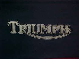 http://tbn3.google.com/images?q=tbn:J3YHyk5XQZAueM:www.coolretrobikes.com/Triumph%2520Logo%2520Mask.JPG