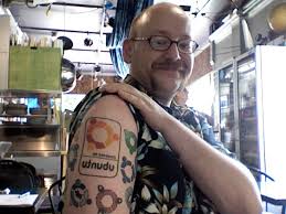 ChrisPowellUbuntuTatoo.jpg