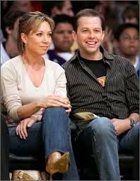  his fiancee Lisa Joyner as they 