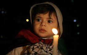  صرخة وطن.........  Gaza-child-candle-independence