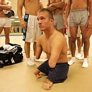 Kyle Maynard awaits a weigh in with 
