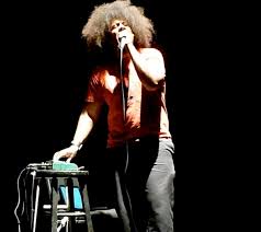 Performance still from Reggie Watts