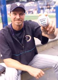 a ball from his perfect game.